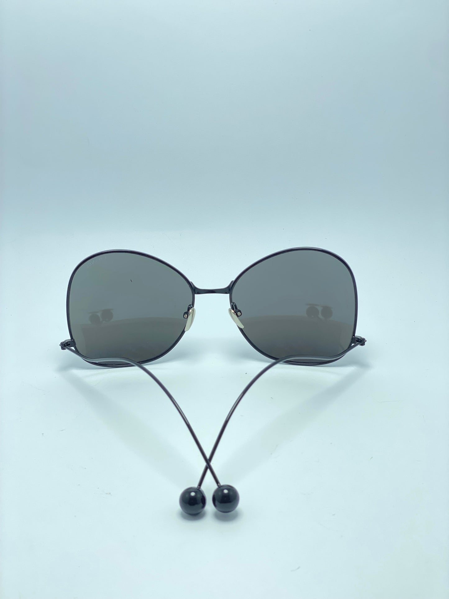 Women's Butterfly Sunglasses Thin Curved Metal Arms Ball Neutral Color